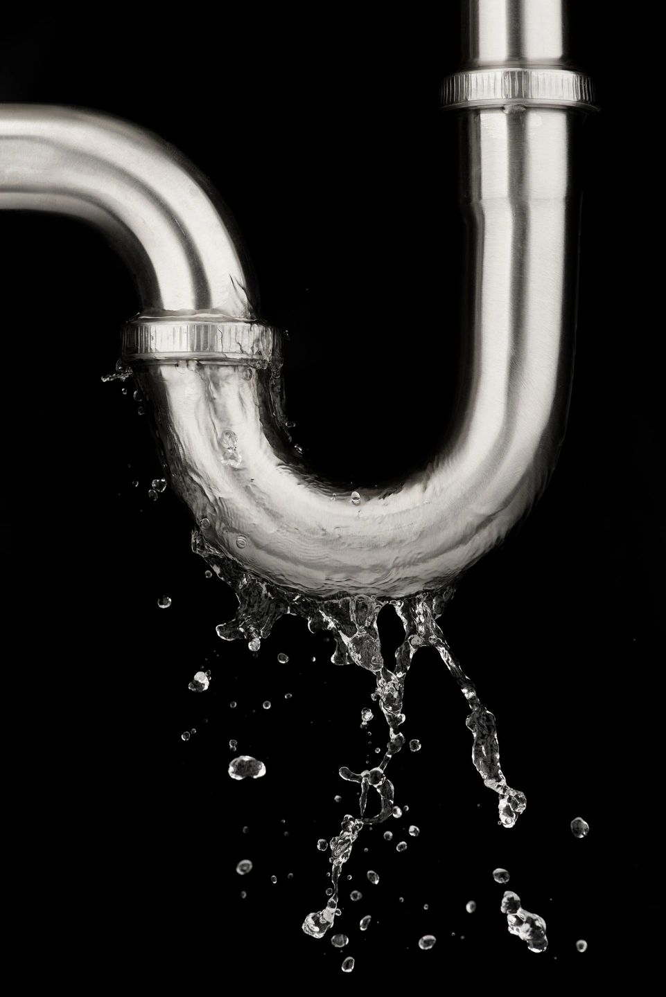 Water dripping from a stainless steel waste trap