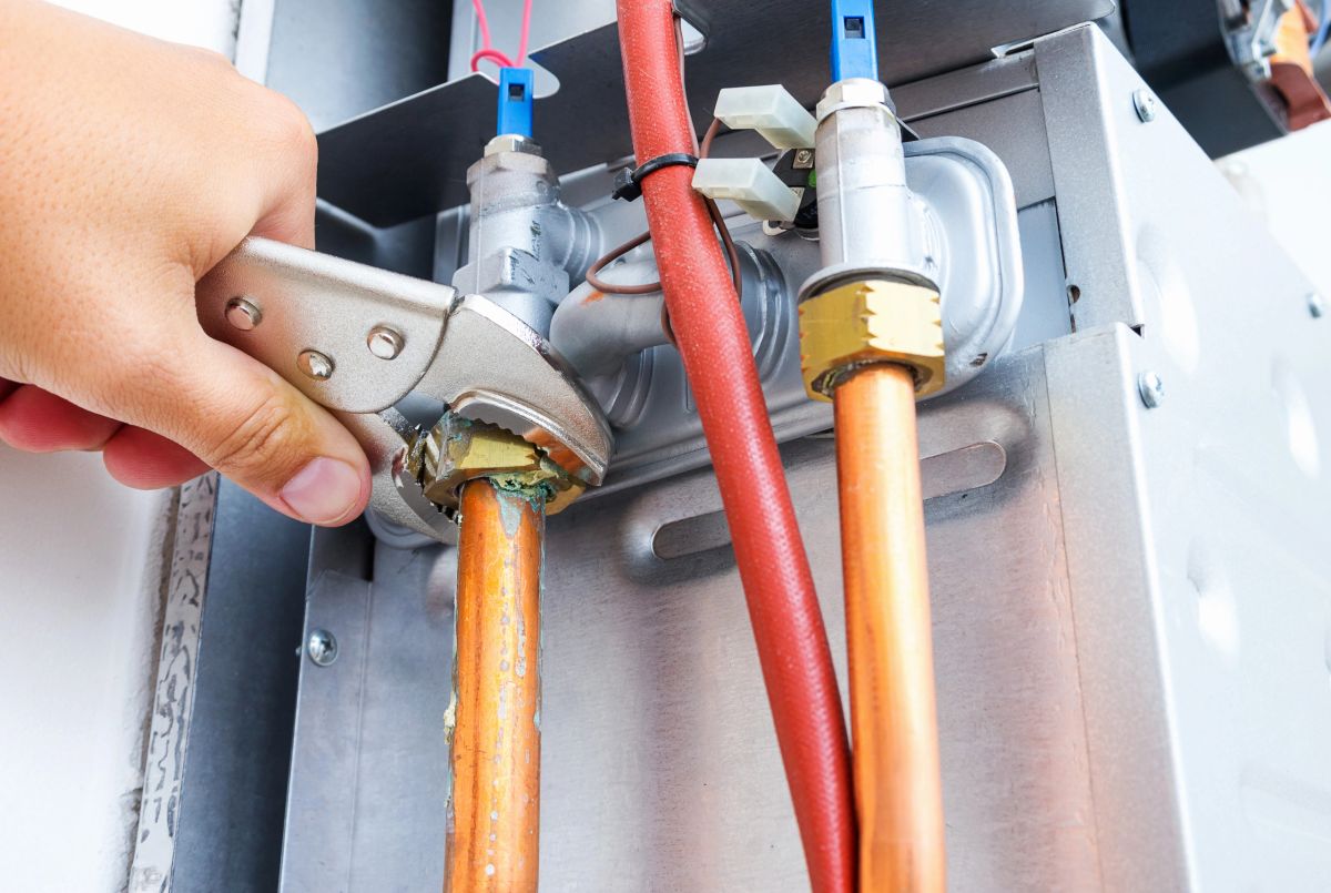 Gas engineer checking an appliance